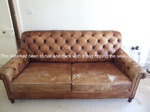 This chesterfield style sofa had got so bad that it had holes in the cushions and had faded
